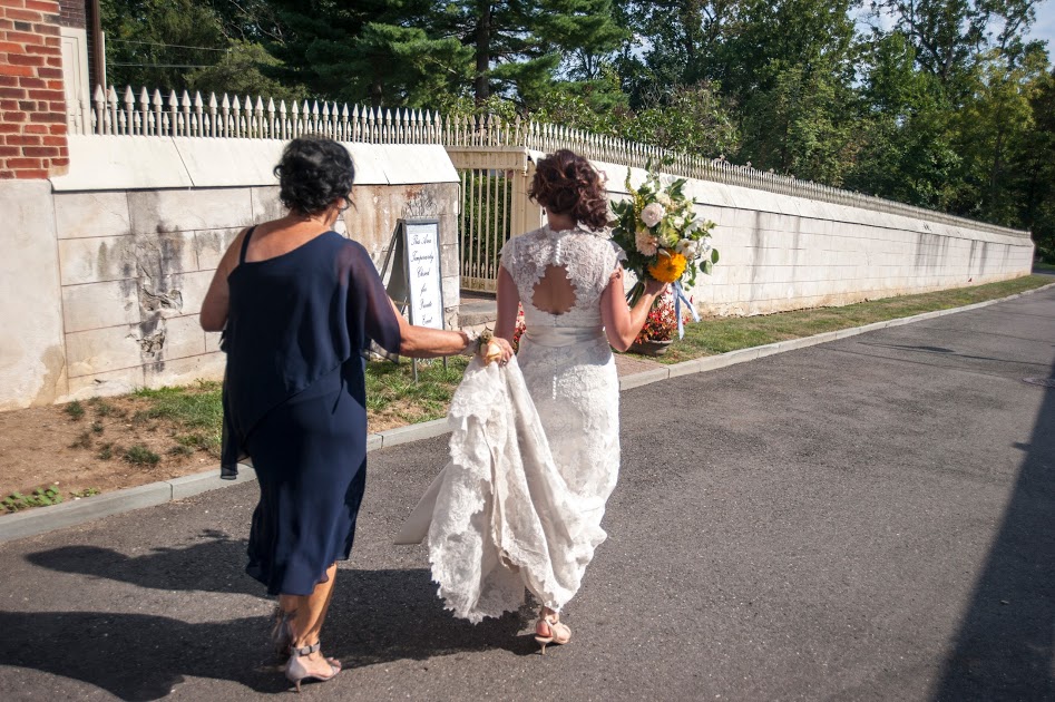 Mom helping Bride with train at Smithville Mansion