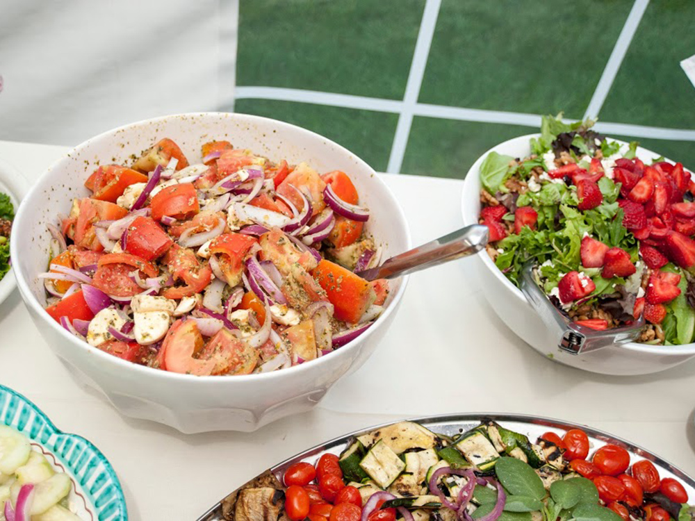 Tomato Salad - Tomato, Mozzarella, red onion & basil in a vinaigrette dressing - Prepared by Robin’s Nest Mount Holly